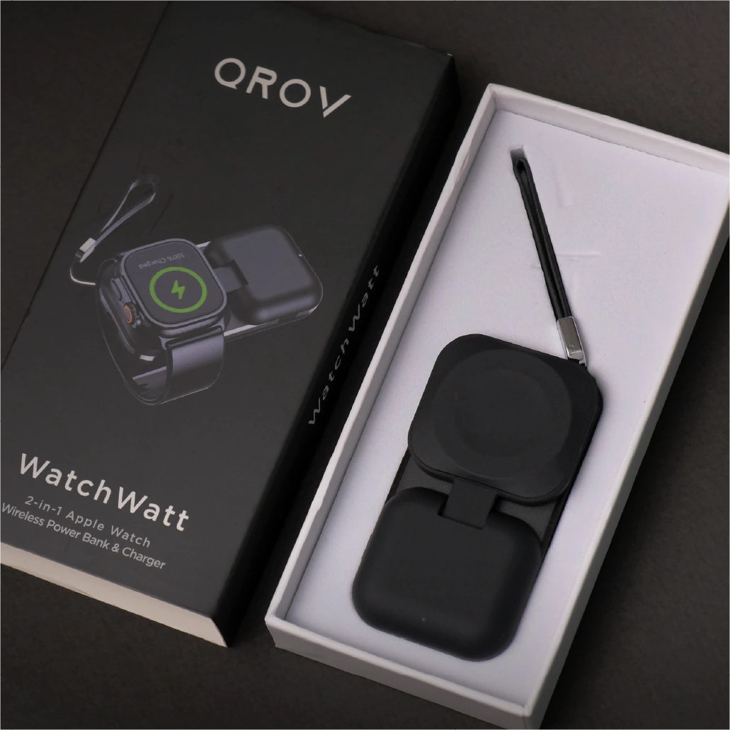 Qrov WatchWatt product in packaging with black case and charging cable.